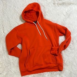 Red/orange hoodie. Never worn. Forever 21.  Size medium.